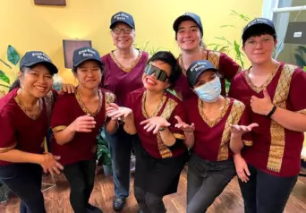 The smiling staff of Krua Khun Rose